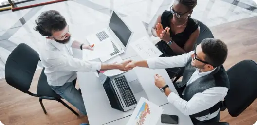 Three people meeting to discuss a workplace complaince audit on a Hawaii construction jobsite.