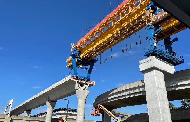 A Raising The Standard Consulting expert conducting comprehensive safety audits in Hawaii at the Oahu monorail construction site.